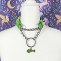 Green nylon pull-chain collar with fish bone pendant on mannequin
